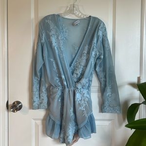 Embroidered baby blue romper with sheer top detail